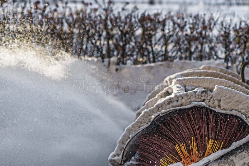 Clearing snow. Tractor clears the way after heavy snow royalty free stock photo