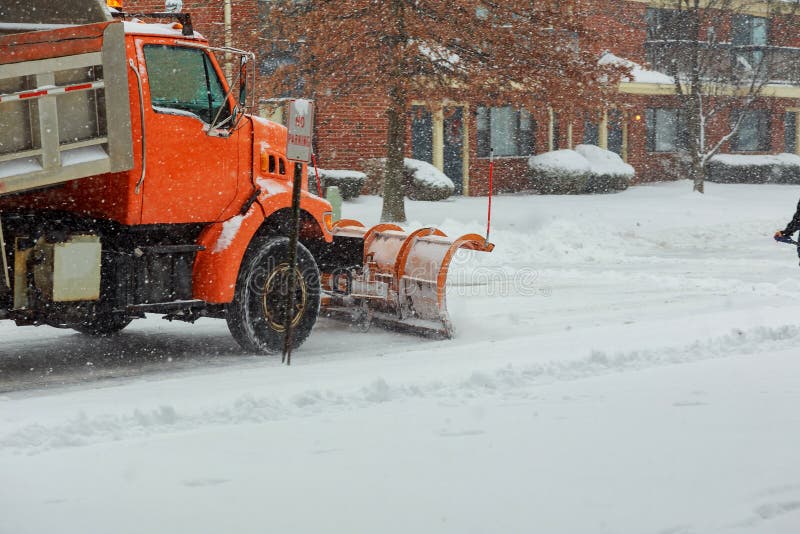 Snow clearing. Tractor clears the way after heavy snowfall. royalty free stock images