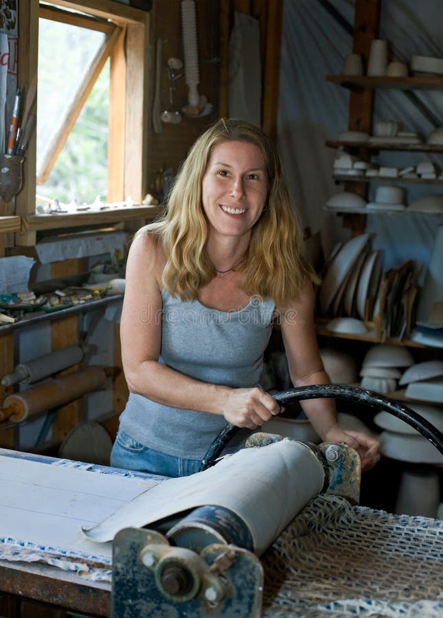 Woman Working in Pottery Studio royalty free stock photo