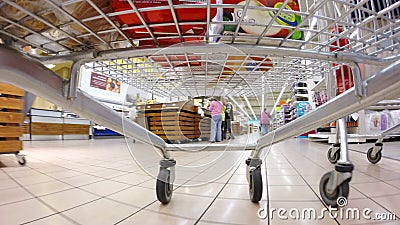 HD 4K (3840X2160) UHDTV: crazy fast speed of supermarket trolley stock video