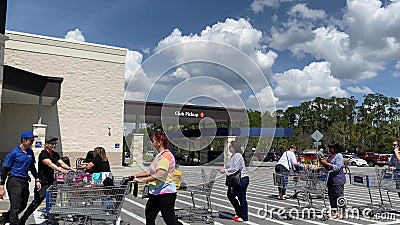 People waiting in line at a Sams Club in Orlando, FL stock video footage