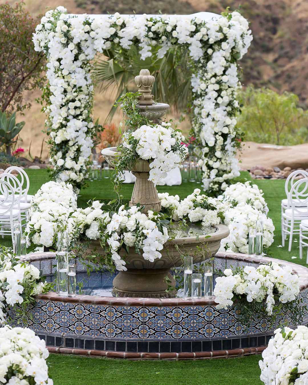 wedding ideas monochromatic flowers arch